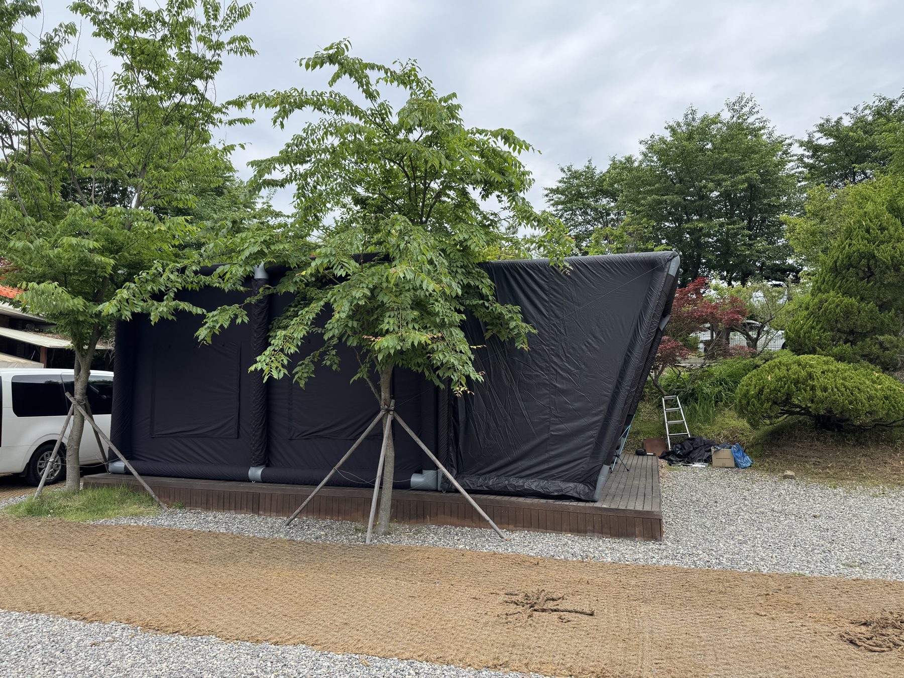 AURONCOVE set up outdoors with its front canopy open